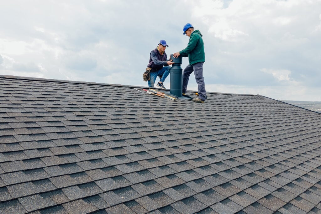 Handnail Roofing inspecting roof replacement options in Montgomery County.